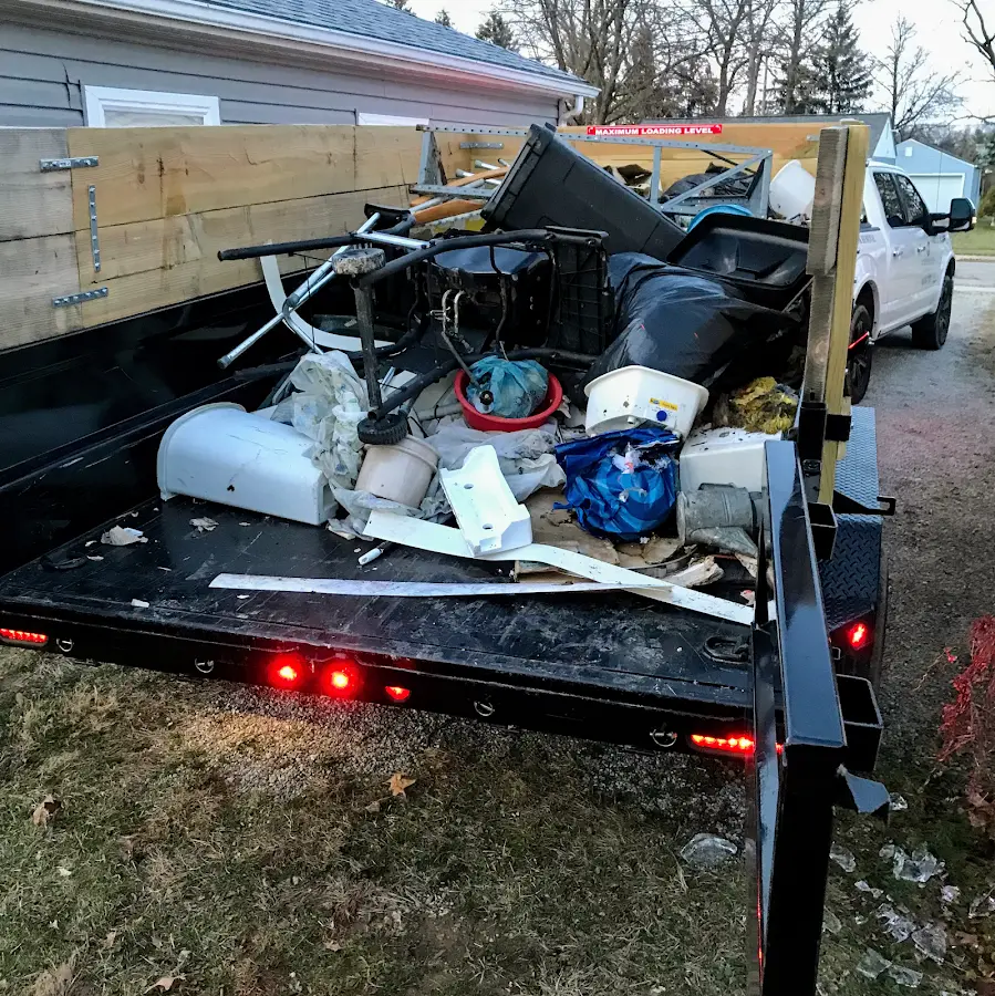 Roll-off dumpster delivered to a residential driveway in St. Cloud